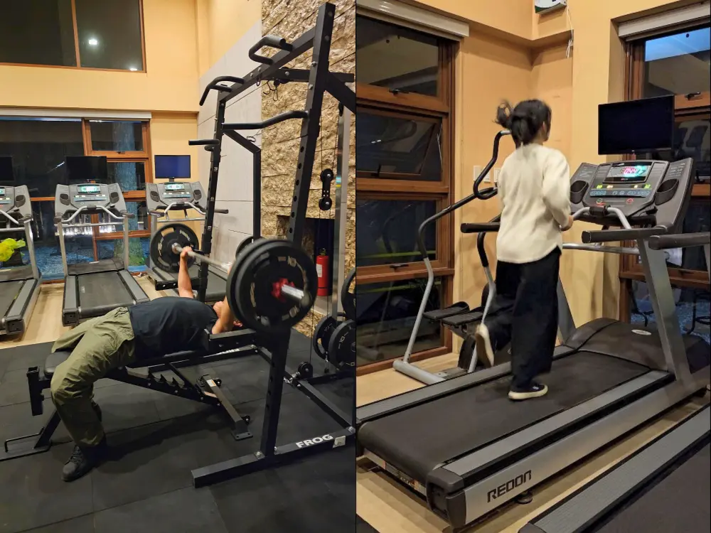 ジムのトレッドミルを走るGrit留学のジェニーとベンチプレスを行うGrit留学の真太郎