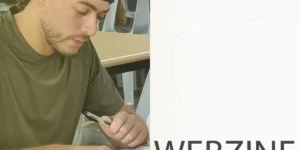 フィリピンのセブ島・リロアンにあるCIJ Academy & Schoolの2026年10月第4週Webzineの表紙で、黒いキャップをかぶった男性学生が机に向かい、ペンを持ちながら学習資料を確認している写真